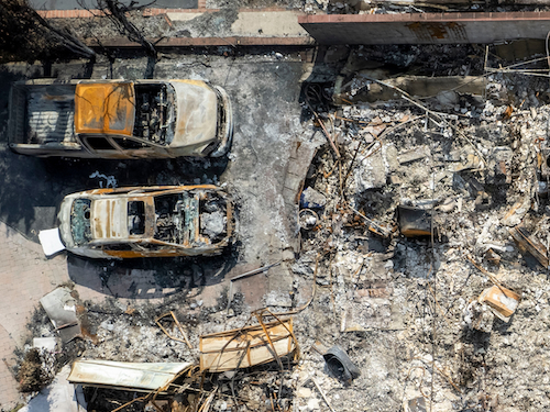 Overhead view of cars and structures burned by the Eaton Fire in Altadena, Calif.
